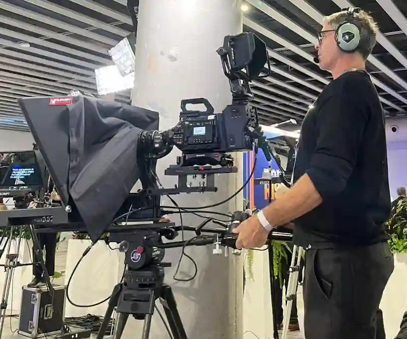Camera operator working at Workday's tradeshow